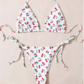 Women's split halter bikini swimsuit in solid colour with backless design and briefs style