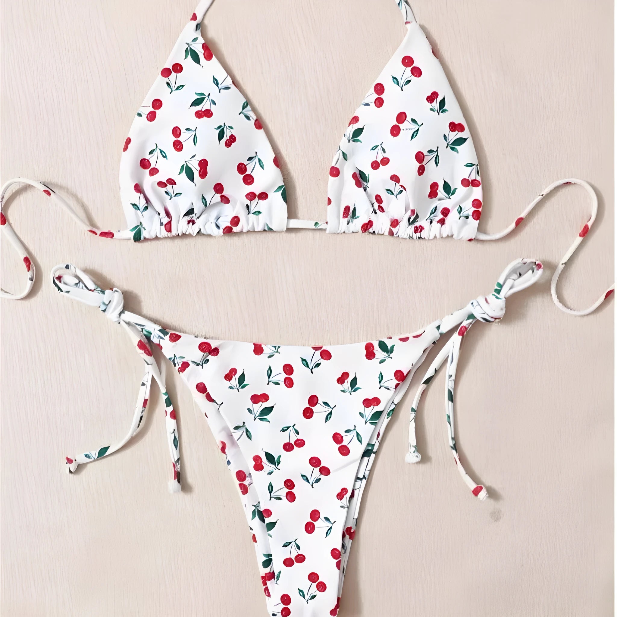Women's split halter bikini swimsuit in solid colour with backless design and briefs style