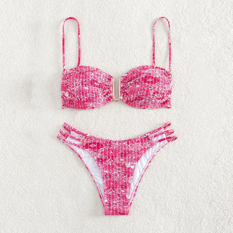 Women's high-waisted floral bikini swimsuit set in a solid colour with a briefs design.