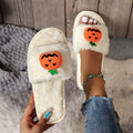 White and yellow Halloween pumpkin cartoon plush slippers with open toe design and anti-slip soles