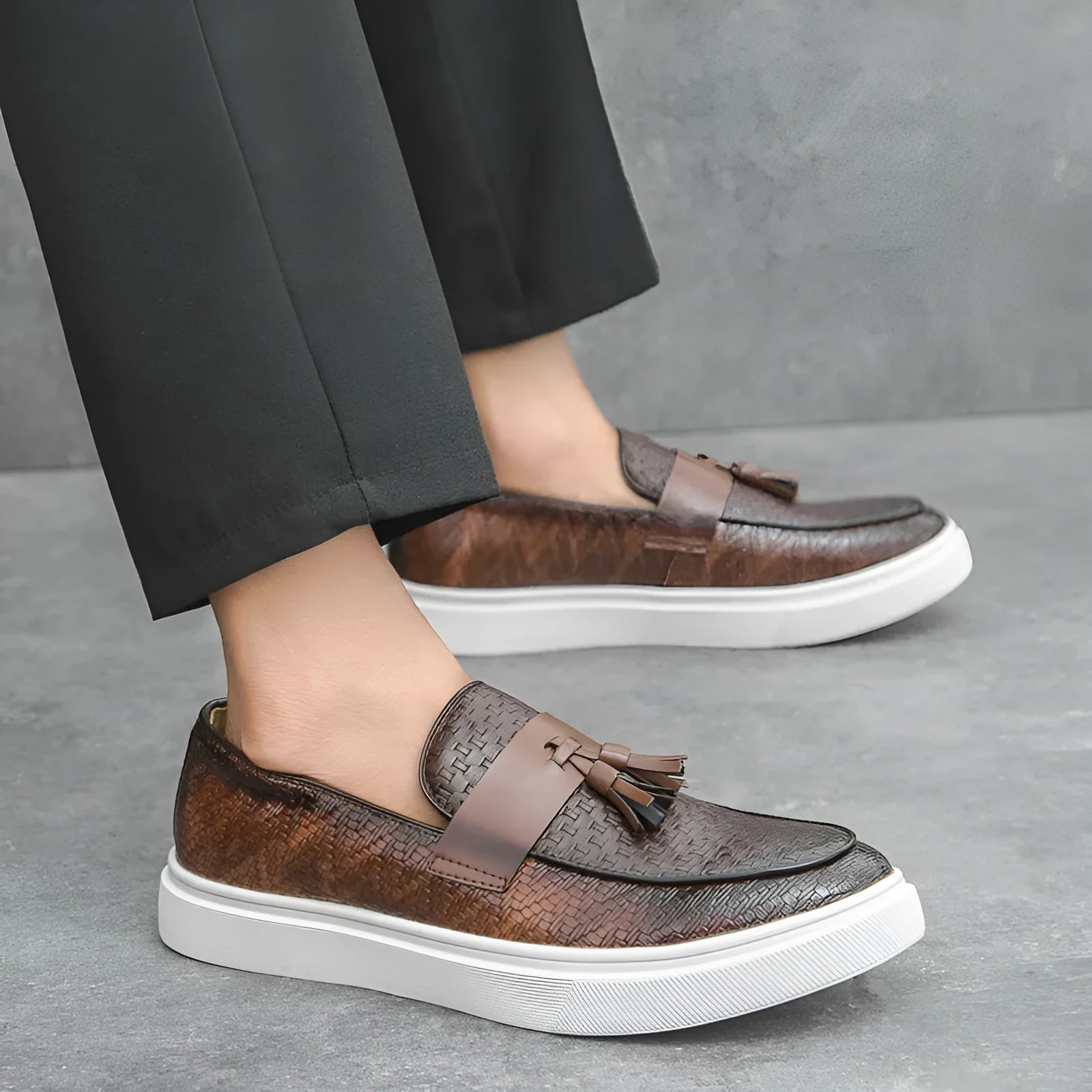 Men's black casual shoes with fringed detailing on artificial PU leather uppers