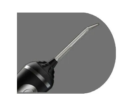 Portable oral irrigator in black, pink or white with rotating nozzle and USB charging cable