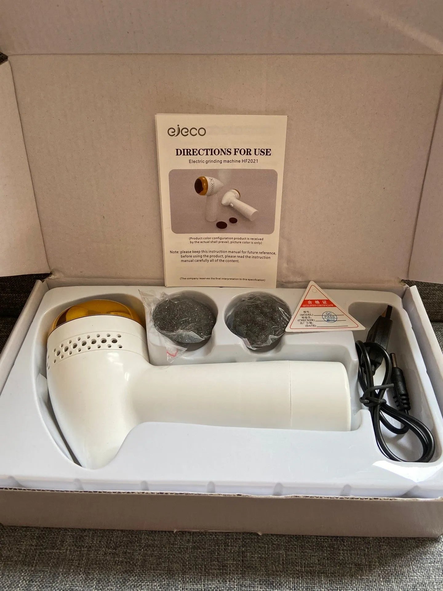 Handheld electric foot grinder with quartz head in gold, pink gold, and white silver colour options.