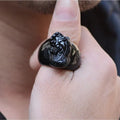 Men's domineering obsidian crystal pixiu thumb ring with gold sheen details on an alloy band.