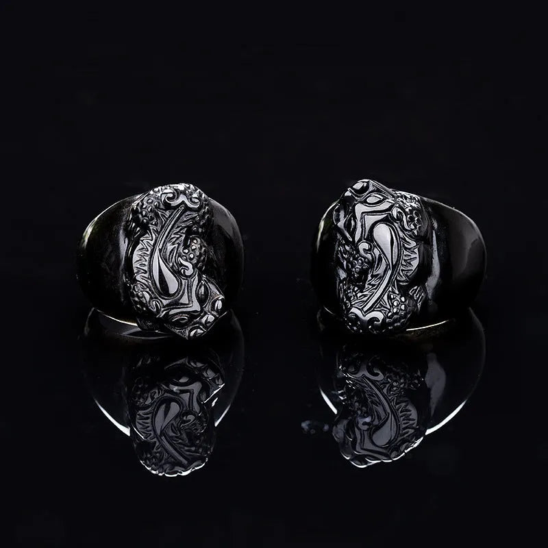 Men's domineering obsidian crystal pixiu thumb ring with gold sheen details on an alloy band.