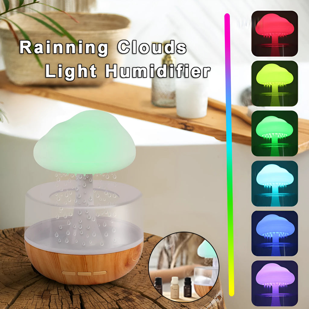 White portable USB humidifier with night light and essential oil diffuser on a wooden surface.