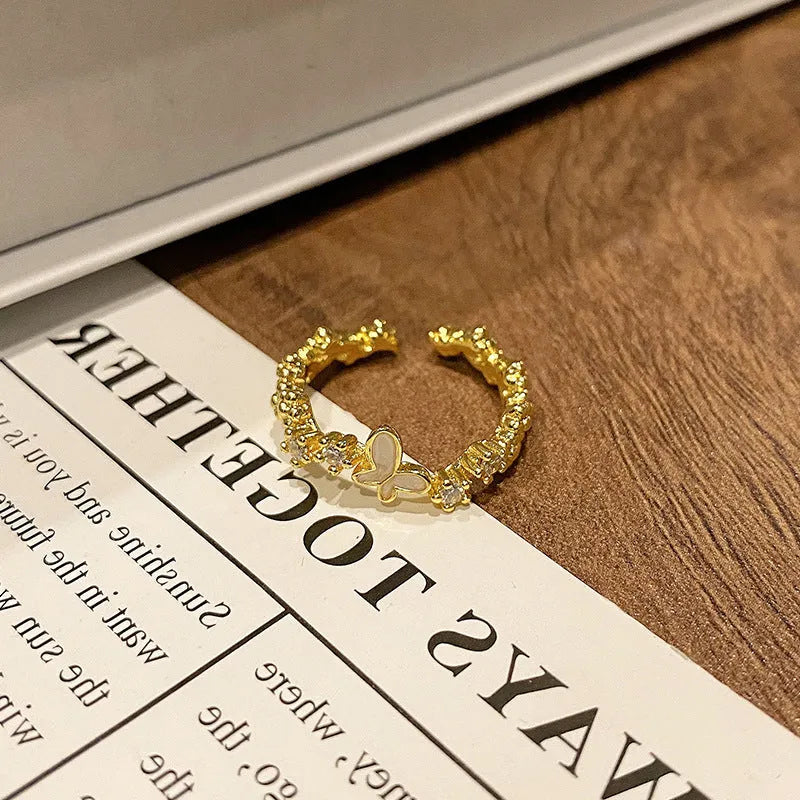 Copper women's ring with Chinese butterfly design and oil-drip finish in simple jewellery style