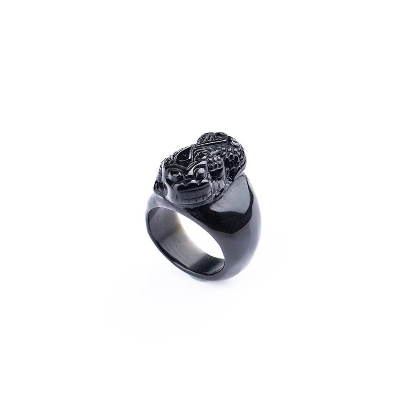 Men's domineering obsidian crystal pixiu thumb ring with gold sheen details on an alloy band.