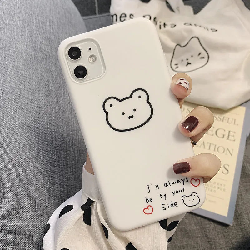 Cartoon bear design on a soft silicone back cover case for an Apple iPhone.