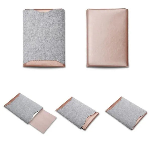 Minimalist black fabric laptop sleeve with built-in mouse pad on a flat surface