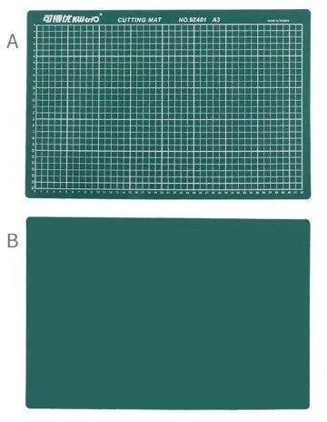 Green A3 self-healing cutting mat showing centimetre grid lines and double-sided design