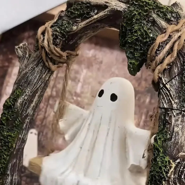 Halloween swing ghost decoration in resin showing two style options with modern art design