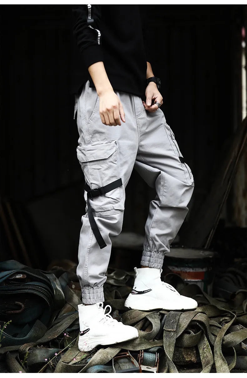 Men's cotton cargo pants in Khaki with multiple pockets, side view
