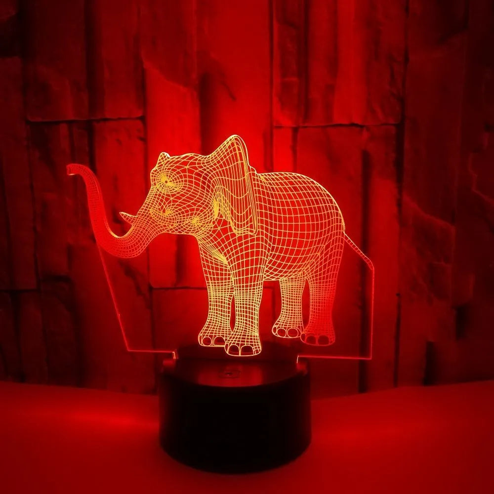 3D elephant-shaped acrylic desk lamp with seven colour modes, USB-powered, on a desk surface