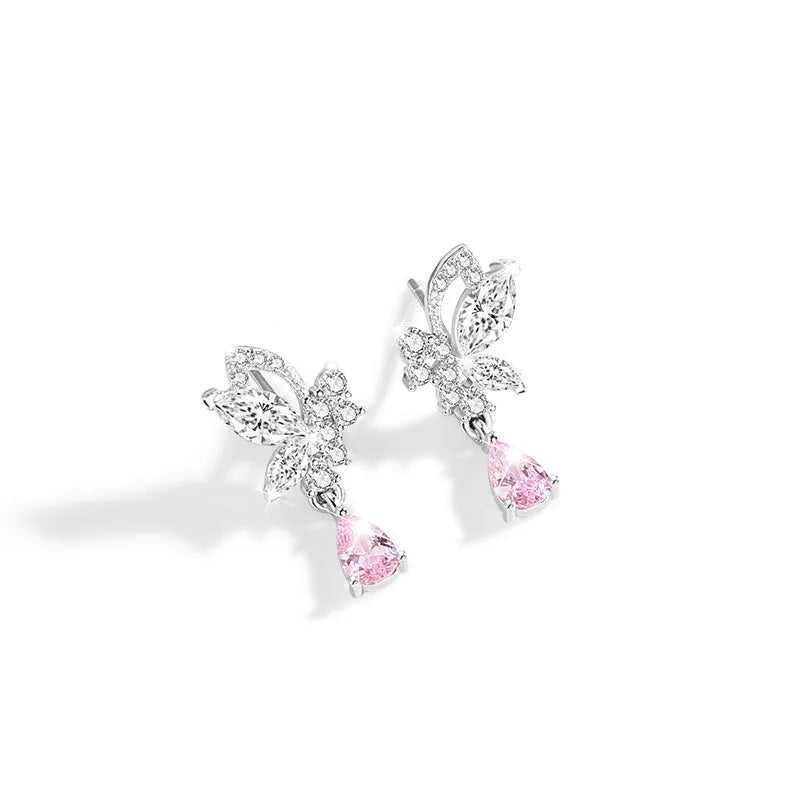 Women's sterling silver butterfly stud earrings with crystal accents on white background