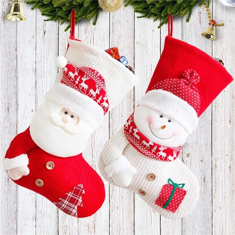Large red and white knitted Christmas stocking with Santa Claus design for fireplace mantel decoration