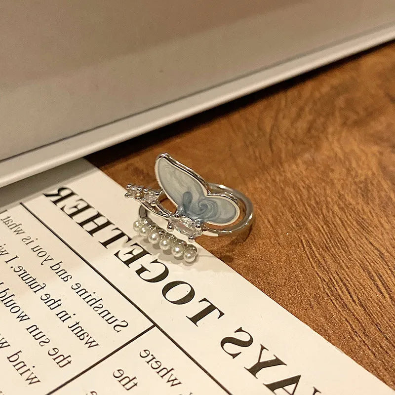 Copper women's ring with Chinese butterfly design and oil-drip finish in simple jewellery style