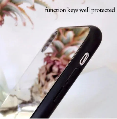 Black iPhone case with a reflective mirror panel on the back, shown fitted to an iPhone.