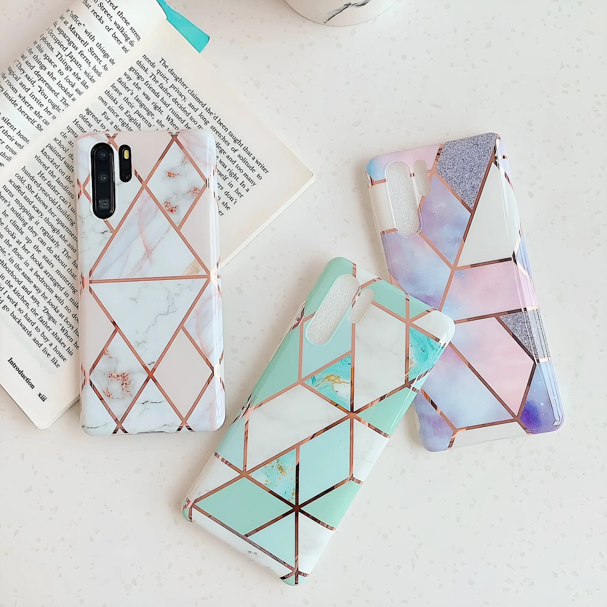 Electroplated marble design phone case for Huawei and Samsung smartphones in various colours.