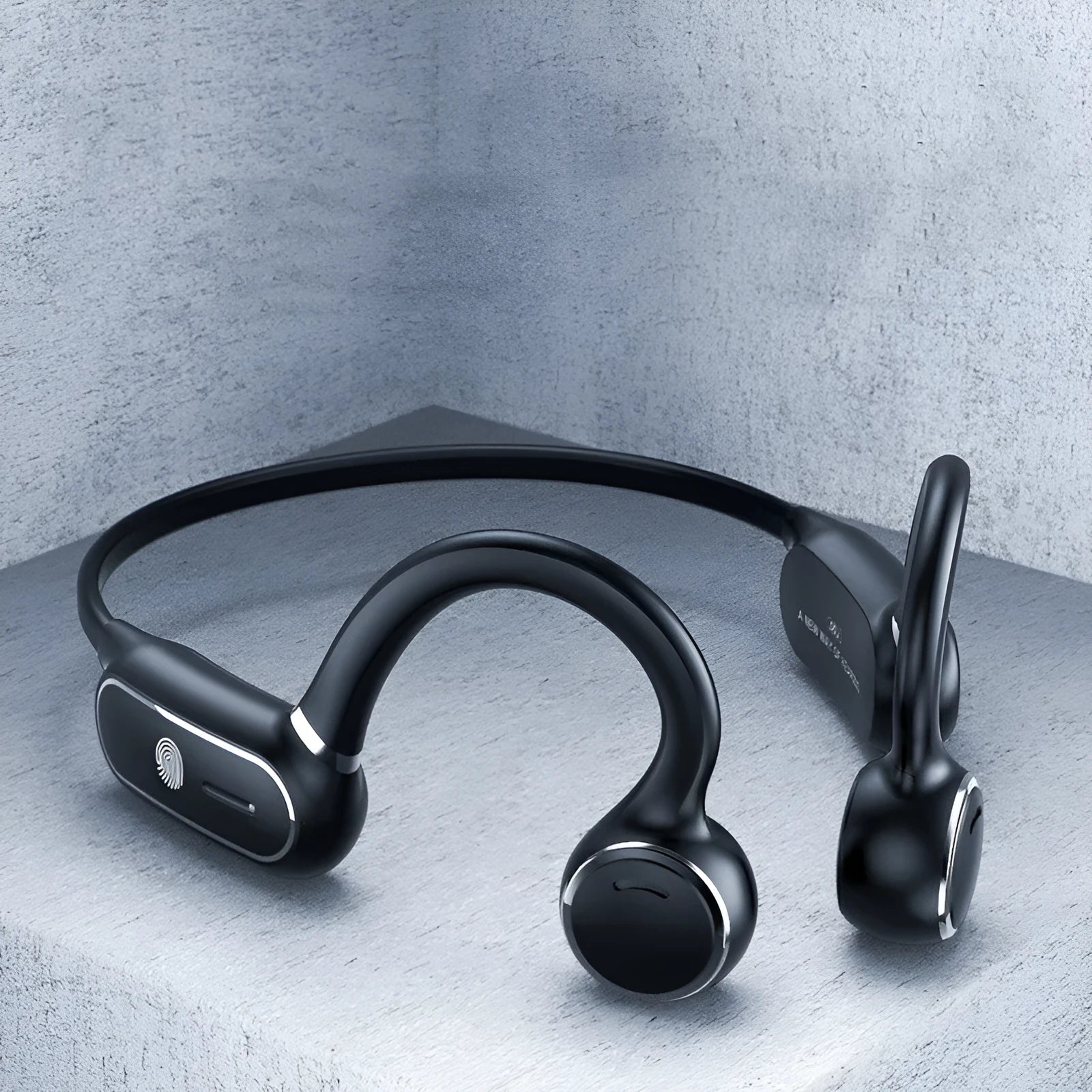 Black open-ear air conduction Bluetooth wireless earphones with a curved titanium alloy frame and touch controls.