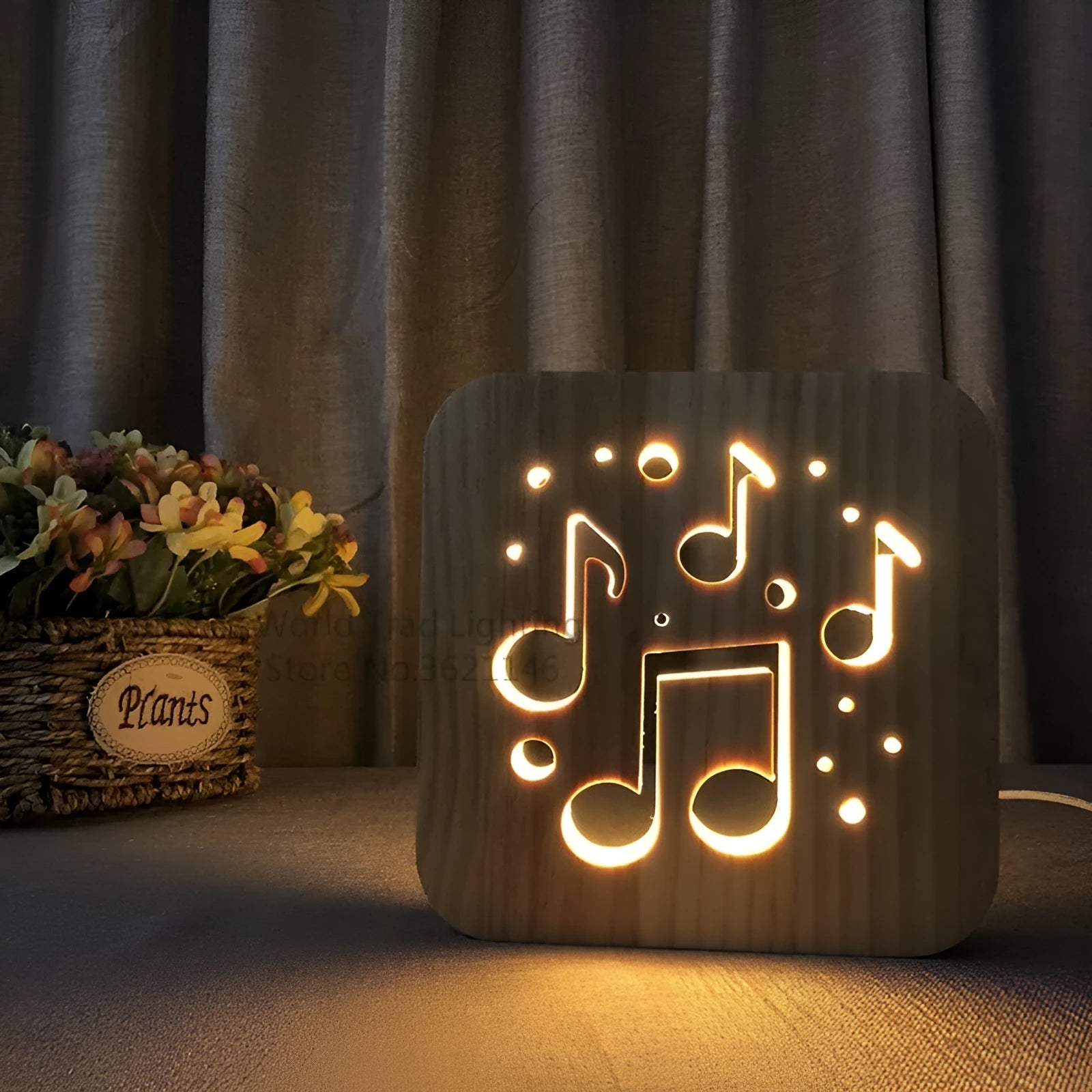 Solid pine wood cube USB atmosphere lamp glowing with warm white LED light on a wooden surface.