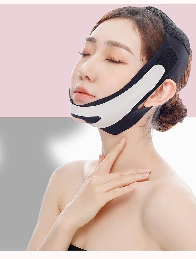 Pink and black elastic V-shaped face bandage for facial contouring and skin care.