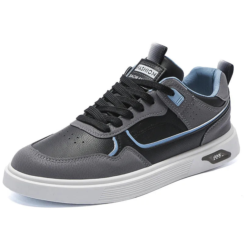 Men's low-top casual canvas shoes in beige with leather stitching detail on a white background.