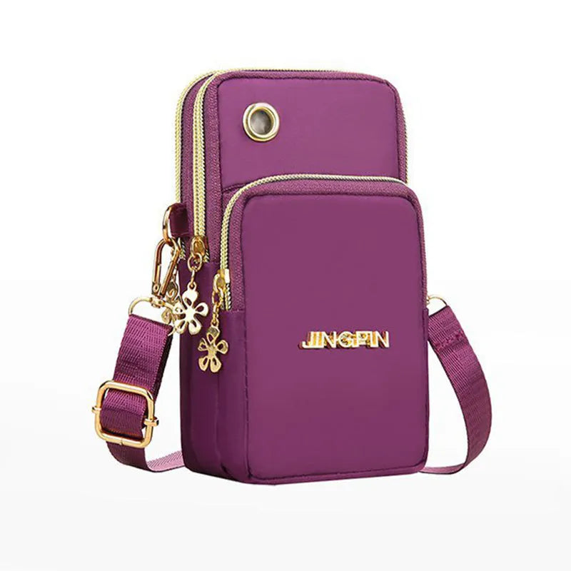 Nylon crossbody mobile phone bag with three zippered layers, card slots, and an adjustable strap in black