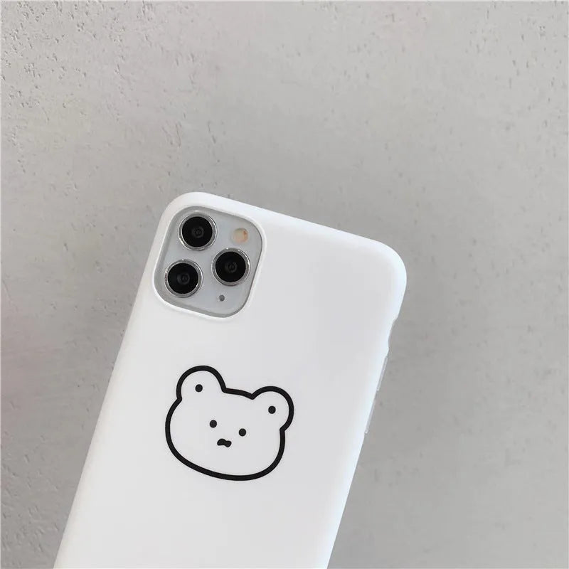 Cartoon bear design on a soft silicone back cover case for an Apple iPhone.