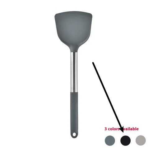 12-piece black silicone kitchen utensil set including spatula, spoon, and claw tools in a rotating storage bucket on a kitchen counter.