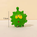 Set of four colourful latex squeaky dog balls with cute faces, each measuring 7.5cm.