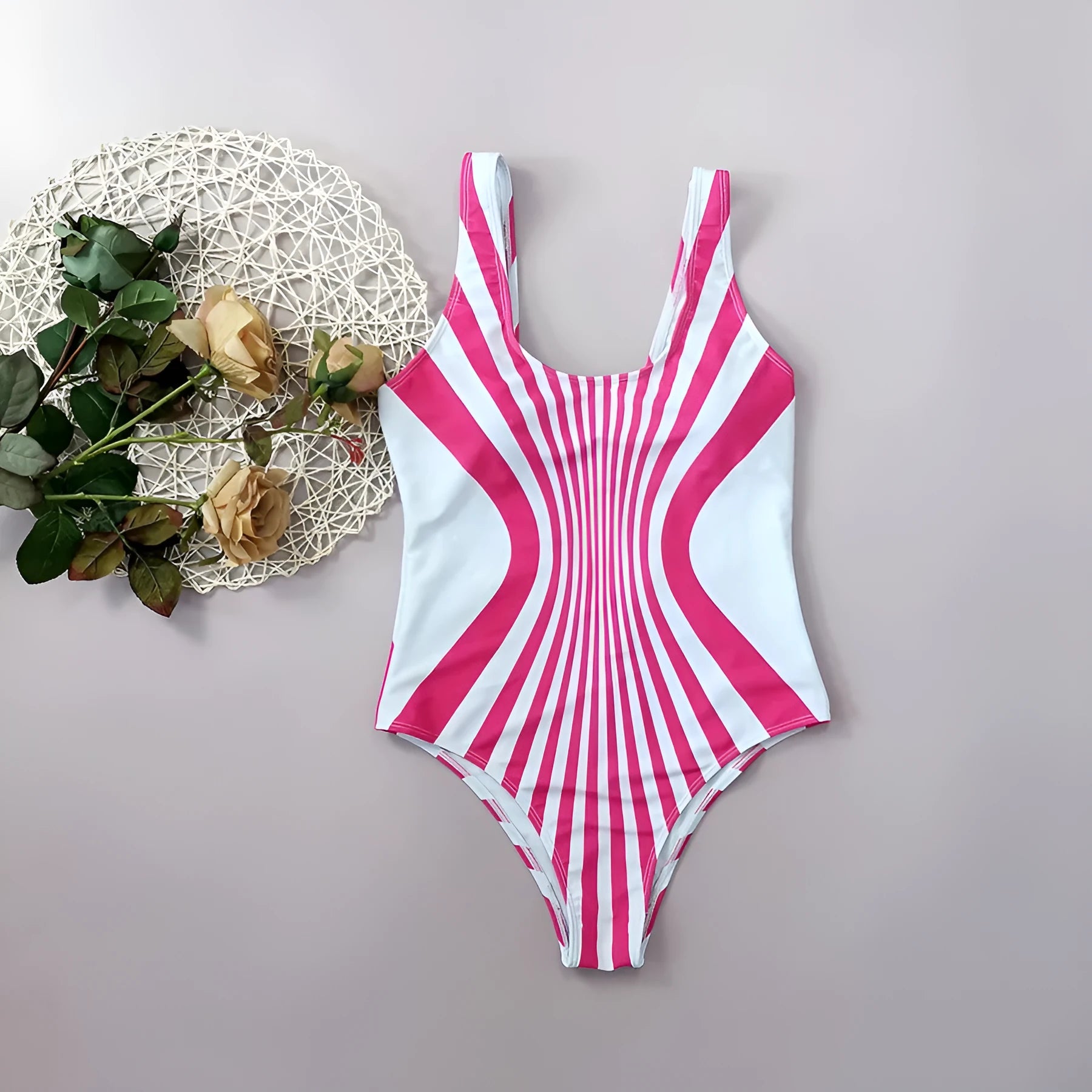 Pink and white striped one-piece swimsuit for women on a mannequin, showing front and back digital print positioning.