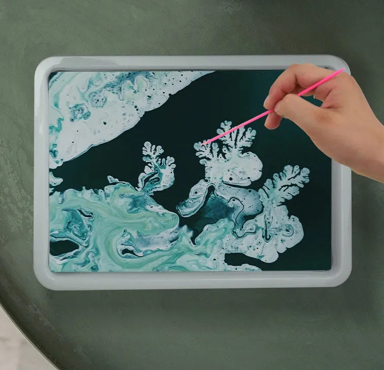 Hand painted floating painting educational kit with gouache liquid, pigment bottles, drawing paper, and stirring rods