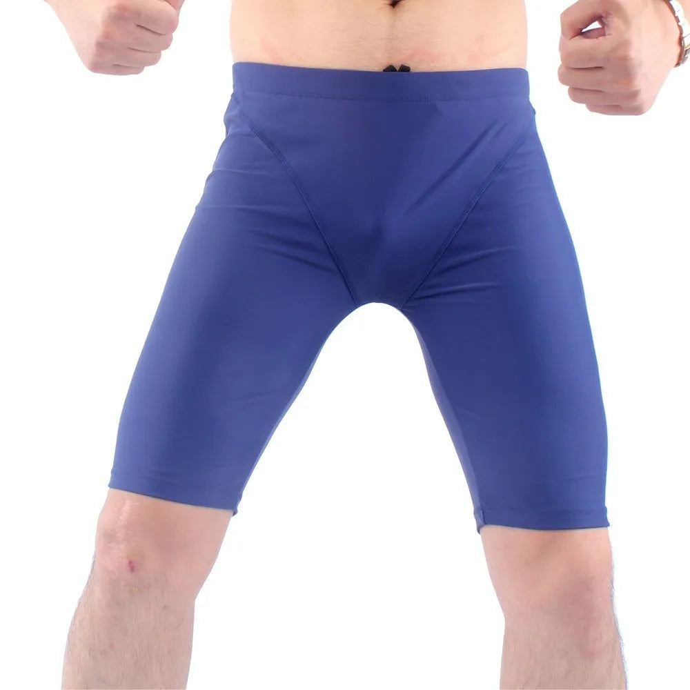 Men's quick-drying swimming trunks in green and navy blue colours with loose plus-size fit