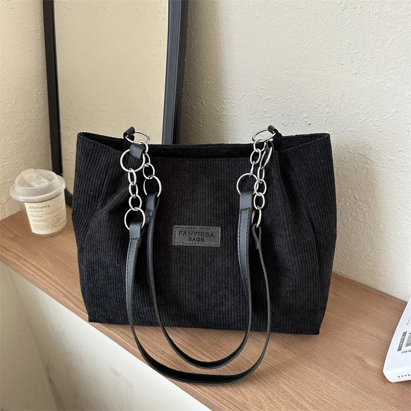 Corduroy one-shoulder tote handbag in black, white or brown with three-dimensional pocket