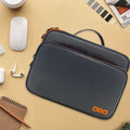 Grey three-layer travel storage bag with sewing line detailing and waterproof polyester construction