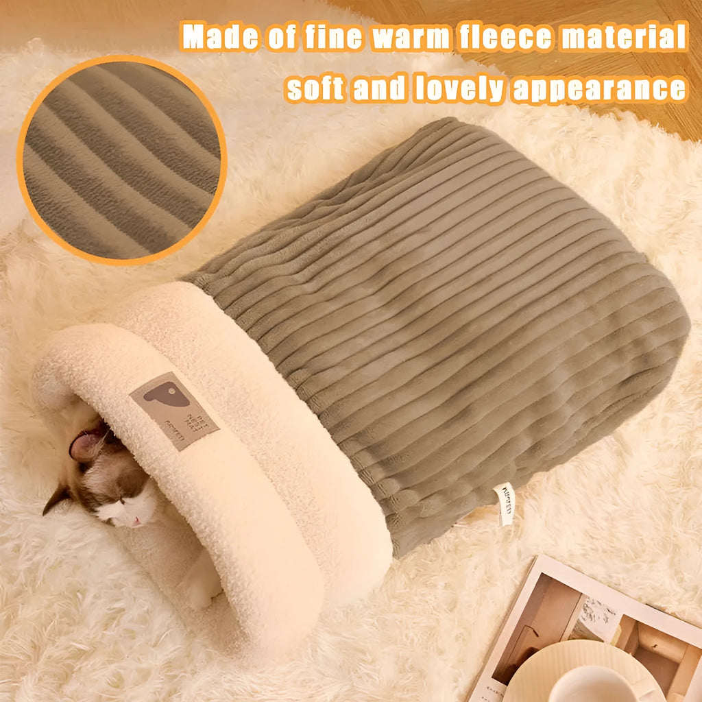 Brown semi-enclosed lambswool cat sleeping bag on a wooden floor.