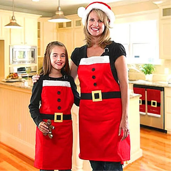 Red polyester Christmas apron shown in adult and children's sizes for festive kitchen use.