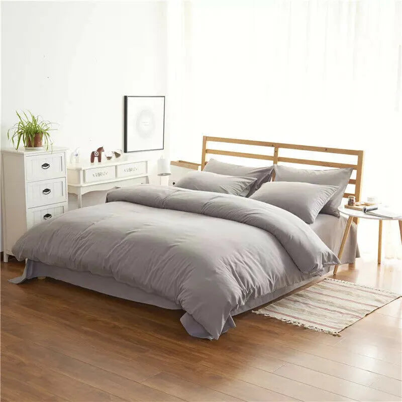 Four-piece polyester bedding set in a modern style for a 2m bed, shown in a choice of colours.