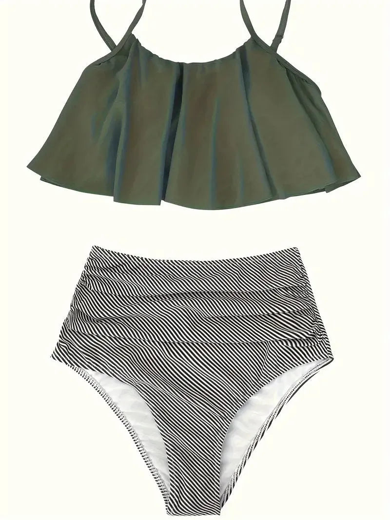 Green women's swimsuit with ruffles, high waist, and backless design on a mannequin.