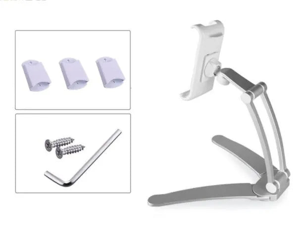 Silver aluminium desktop tablet stand holding a tablet, showing 360-degree rotation and dual adjustable clip design.
