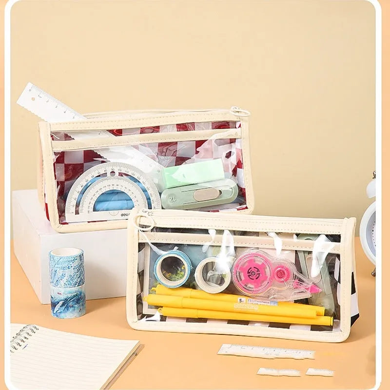 Clear PVC pencil case with chessboard pattern showing pens inside