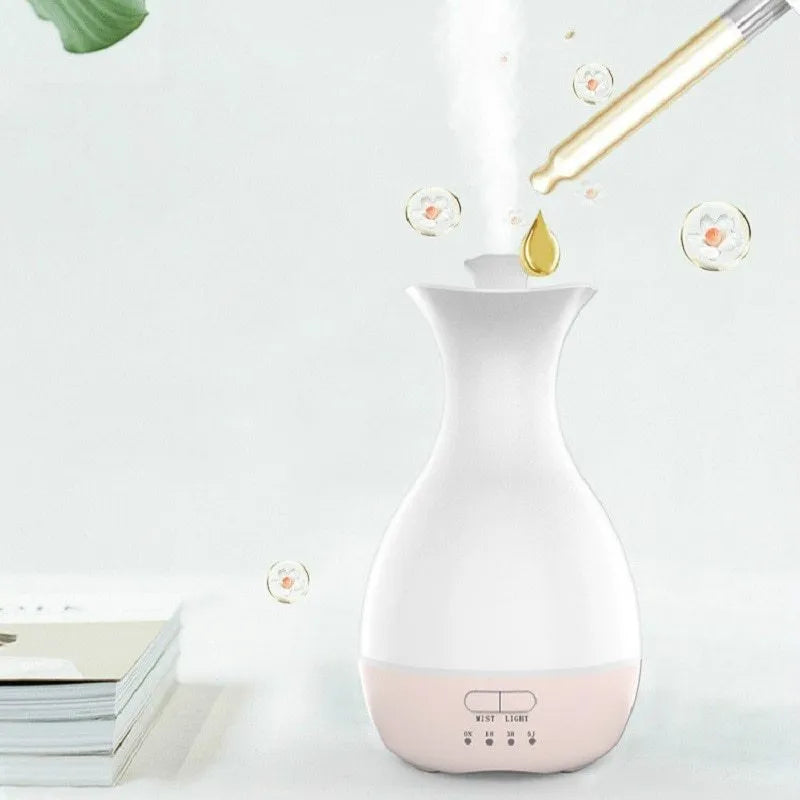 White or pink ultrasonic aromatherapy vase diffuser with 200ml capacity and colourful LED night light