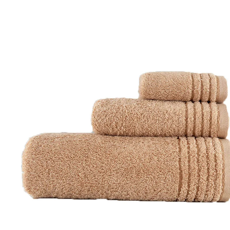 Cotton towels set showing bath, hand and guest towels in brown colour