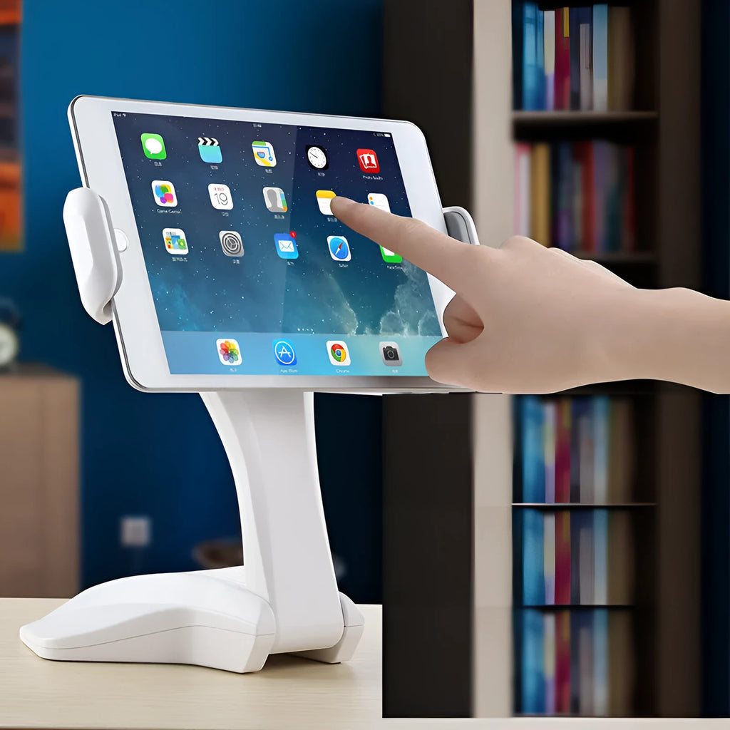 White foldable universal tablet stand with adjustable clamp extended, holding a tablet.