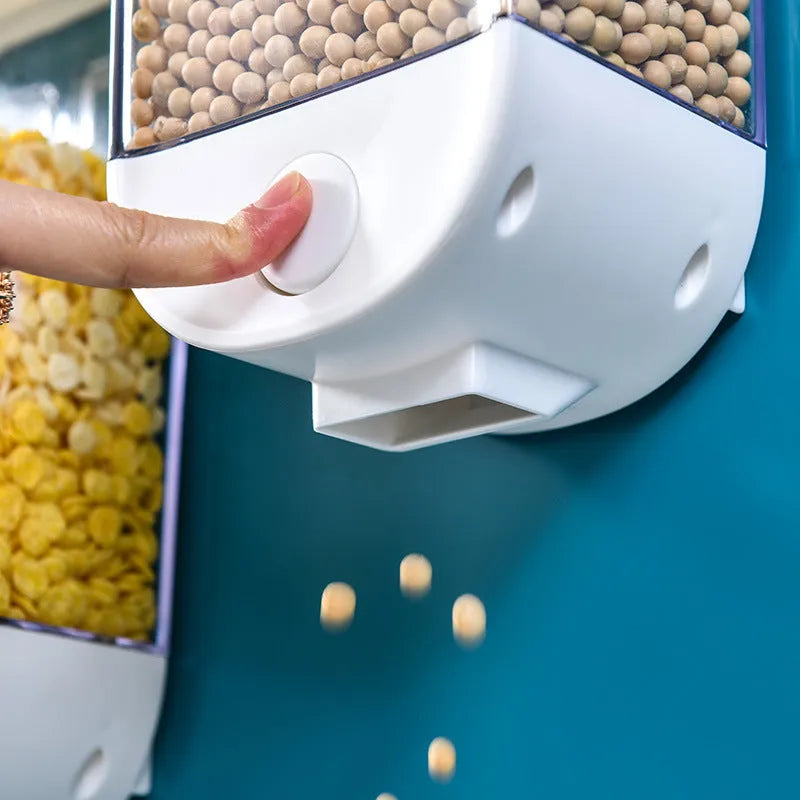 White wall-mounted transparent kitchen food storage container with easy-press cereal dispenser lid.