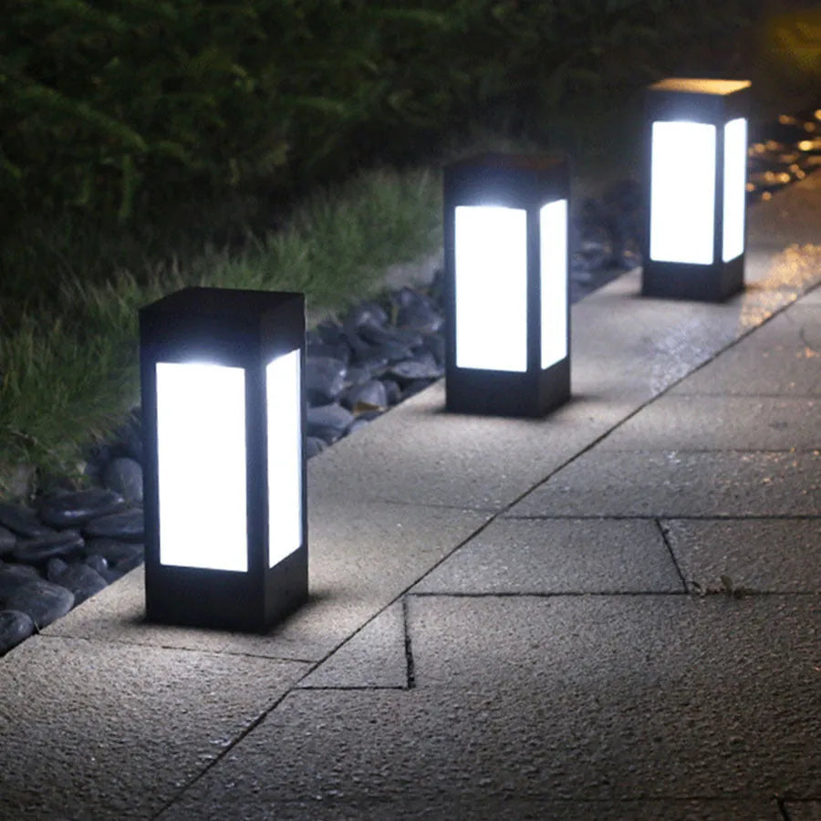 Waterproof solar-powered LED garden light in one of four styles, for wall or landscape use.