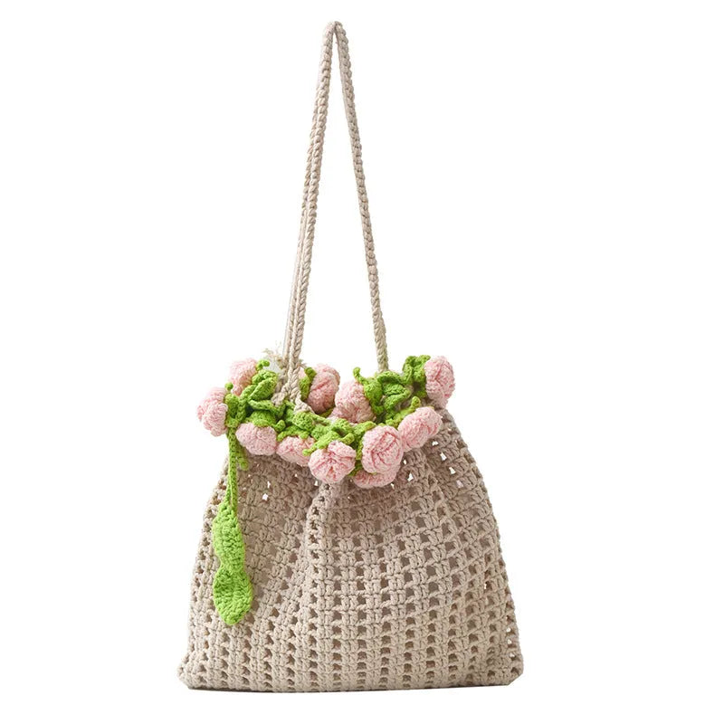 Artistic girls' one-shoulder bag with woven rose bouquet design in pink and red, soft material, double straps