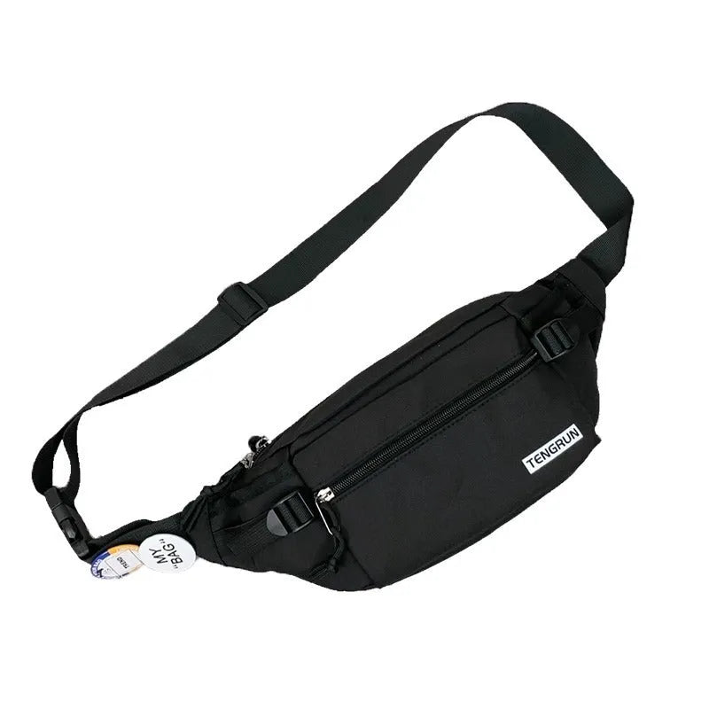 Trendy chest bag for men in Oxford cloth with letter pattern, adjustable strap, and two random badges on a plain background