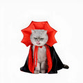Small black pet vampire cloak costume for dog or cat on hanger with S M L size tags.
